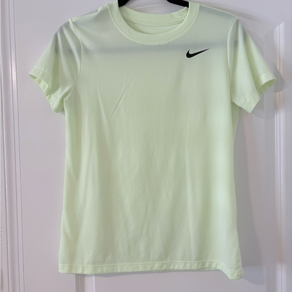 NWOT Nike Light Yellow Dry Fit Shirt Woman’s